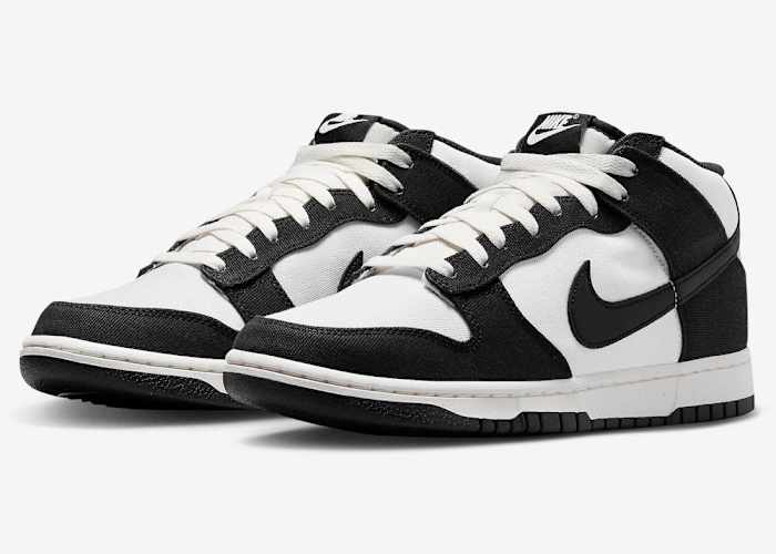 Side view of black and white Nike Dunk shoes.
